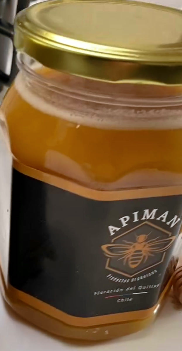 Frasco de miel Apiman con etiqueta hexágono